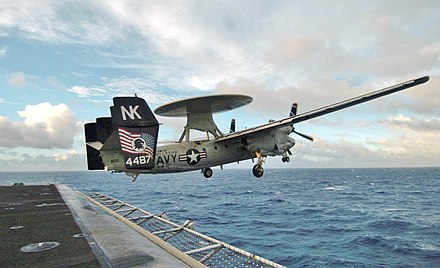 A U.S. Navy E-2C Hawkeye launches from USS John C. Stennis