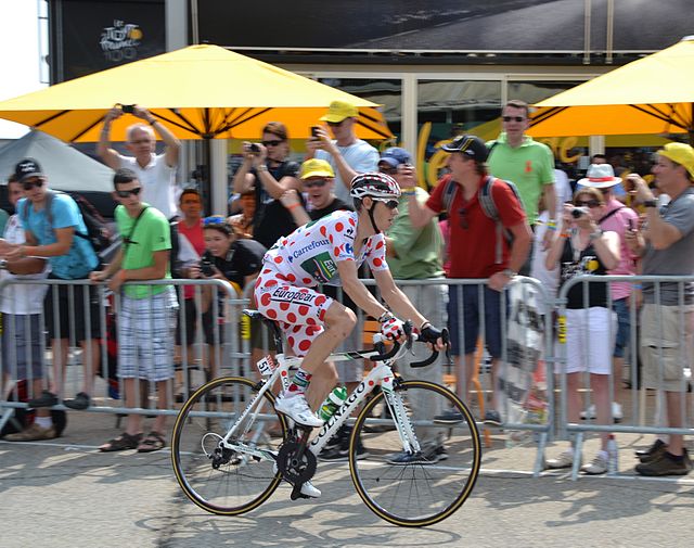 Rolland riding in the polka-dot jersey at the 2013 Tour de France