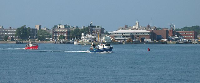 A view of downtown Woods Hole from the water, including MBL and WHOI buildings