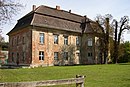 Manor complex, consisting of manor house, inspector's house, three farm buildings, distillery, courtyard with paving and plants, remnants of the manor park, system of avenues and fish ponds (so-called Thiergarten)