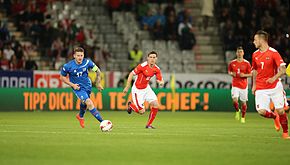 Aron (left) playing for Iceland in 2014 2014-05-30 Austria - Iceland football match, Aron Gunnarsson 0742.jpg