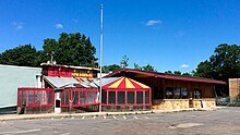 Famous Dave's second location was in the Linden Hills neighborhood of Minneapolis and was built in 1995 to look like a classic BBQ shack; it was demolished in 2016. 20150530-FamousDaves2ndLoc-LindenHills.jpg