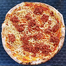 A basic spaghetti pizza prepared using bolognese sauce