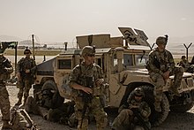 34th Infantry Division soldiers, part of Task Force Spartan, provide security at Hamid Karzai International Airport during the 2021 Kabul airlifts. 34th Infantry Division Soldiers support Kabul evacuation operations.jpg