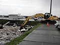 389 Excavator removes debris from CC Harbor (15119521981).jpg