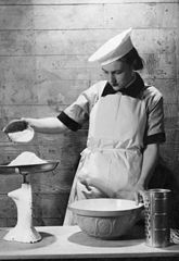 A Cecil Beaton portrait of a cook in the Women's Royal Naval Service. A9747.jpg