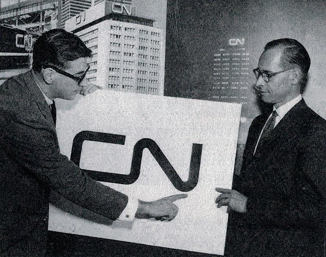 Designer Allan Fleming and CN director of communications Charles Harris at the launch of the CN logo at Montreal in 1960. Fleming's logo has since bec