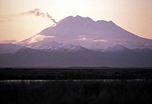 An Alaska Peninsula smoking volcano.jpg