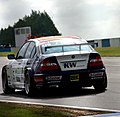 Antonio Garcia - BMW 320i heads for Goddards at the 2004 ETCC rnds 11-12 at Donington (50897626343).jpg