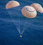 The Apollo 17 space capsule about to splash down in the south Pacific Ocean.