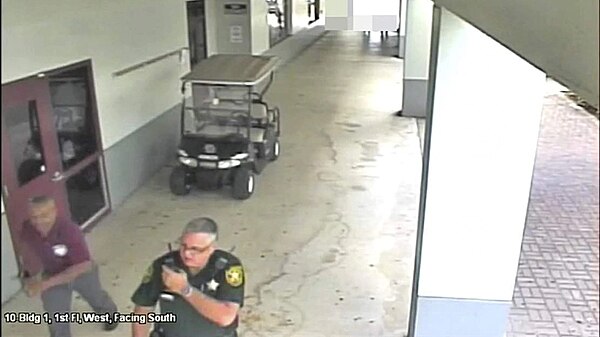 BCSO deputy Scot Peterson outside Building 12 during the shooting