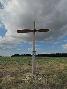kříž s vrtulí
