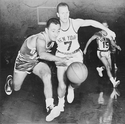 Bob Cousy (left) was selected third overall by the Tri-Cities Blackhawks.