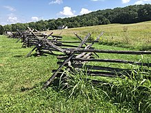 Buck-and-rail fencing such as this in West Virginia was ubiquitous in the Eastern Theater of the American Civil War, as it was easily made as long as there was plenty of timber readily available. Soldiers from both sides of the war made use of wood from these fences for their camp fires. Bolivar Heights Battlefield, fence on Bakerton Road.jpg