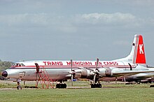 Canadair CL-44 swing-tail freighter of Transmeridian at London Stansted Airport in 1976.