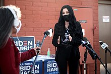 Cher speaking with the media at an early voting center at Fowler Elementary School District in October 2020 Cher (50537698337).jpg