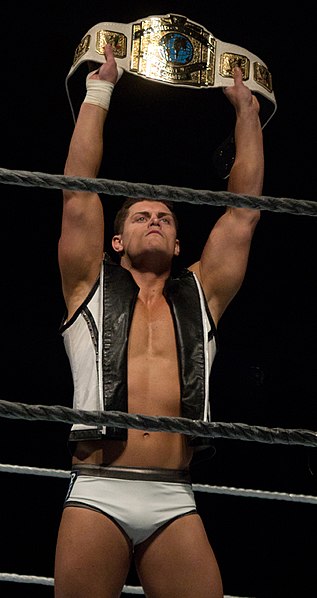 File:Cody raises IC strap.jpg