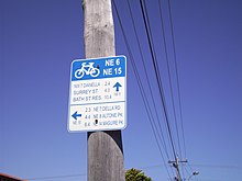 Perth Bicycle Network (PBN) guidance sign showing routes NE6 and NE15 E37 Perth bike route sign NE6 NE15.jpg