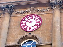 Clock on The Exchange, Bristol, showing two minute hands, one for London time (GMT) and one for Bristol time (GMT minus 11 minutes). Exchangeclock.JPG