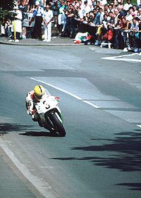 Joey Dunlop at the bottom of Bray Hill in the 1992 Senior TT race, on his Honda RC30 JoeyDunlopTT1992BrayHill.jpg