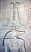 A wall relief from Kom Ombo showing Sobek with solar attributes