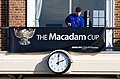 Macadam Cup banner with emcee