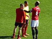 Manchester United 1 vs. 0 Watford. From left to right: unidentified soccer player, Richarlison and Paul Pogba. (13 May 2018)