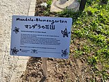 Infotafel zum Mandala-Blumengarten des Künstlers Ghaku Okazaki vor dem Kulturpark RT-Nord in Reutlingen-Rappertshofen