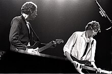 Knopfler and Lindes onstage in Amsterdam, June 1981 Mark Knopfler and Hal Lindes 1981.jpg