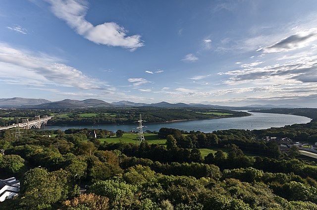 The strait from Anglesey, looking towards Gwynedd, with the Britannia Bridge to the left.
