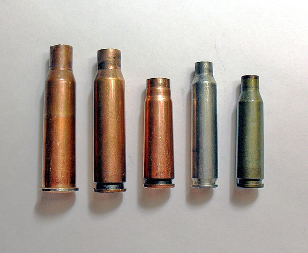 Service rifle cartridge cases: (Left to right) 7.62×54mmR, 7.62×51mm NATO, 7.62×39mm, 5.56×45mm NATO, 5.45×39mm.