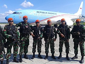 Kopasgat Commandos in Biak air base with the Presidential Aircraft at the background Paskhas Commandos.jpg