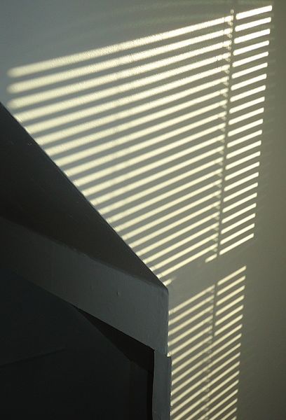 File:Pattern of light on a white wall made by sun through blinds.JPG