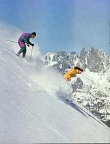 Skiers coming off top of Mammoth