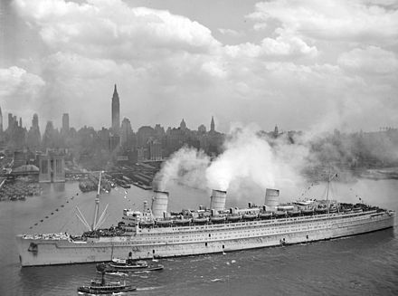 The Queen Mary, serving as a troopship, arriving in New York in 1945