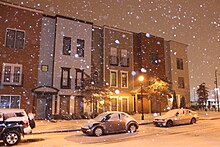 Recent revitalization efforts in the Vine City neighborhood include the Westside Commons town home complex, photographed here during the 2014 snowstorm. Rare snow day in Vine City 2014.JPG