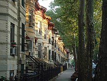 Row houses in Bushwick, Brooklyn. Row houses in alternating cream, yellow, and gray brick, in Bushwick, Brooklyn.jpg