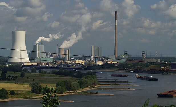 View from the rubble dump Alsumer Berg on coal industry of Duisburg-Walsum at the river Rhine 2011, Ruhrgebiet, Western Germany