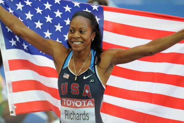 Richards-Ross celebrating her victory at the 2009 Berlin World Championships