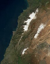 Lebanon from space. Snow cover can be seen on the western Mount Lebanon and eastern Anti-Lebanon mountain ranges Satellite image of Lebanon in March 2002.jpg