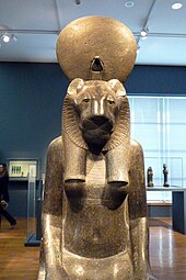 The goddess Sekhmet at the exhibition Serving the Gods of Egypt. Sekhmet remployee par Chechong Ier (de face) - Servir les dieux d'Egypte - Musee de Grenoble.jpg