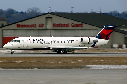 Bombardier CRJ200, owned and operated by SkyWest for Delta Connection, landing at Minneapolis-St Paul International Airport.