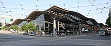 Southern Cross railway station from the corner of Collins and Spencer Streets Southern-cross-station-melbourne-morning.jpg