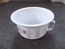 Plastic adult chamber pot Sturdy, durable, plastic potty of classic design.JPG