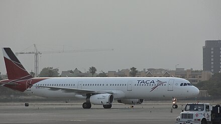 A TACA International Airbus A321-200 landing at Los Angeles International Airport