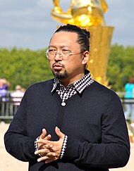 Japanese Artist Takashi Murakami at the Palace of Versailles giving an interview to a film crew about his new exhibit 10th of September 2010