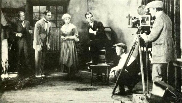 Ingram at work with Ralph Lewis, Rudolph Valentino, and his wife, Alice Terry, on the set of The Conquering Power