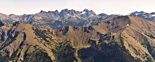 The Needles on the skyline with Mount Walkinshaw the leftmost, as seen from Elk Mountain The Needles from Elk Mountain.jpg