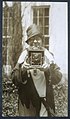 Three-quarter length portrait of Jessie Tarbox Beals standing outside with her camera, ready to photograph someone, probably President Calvin Coolidge, ca. 1927-1929. (22787571865).jpg