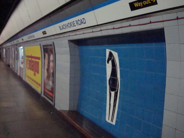 The black horse tile motif at the tube station.